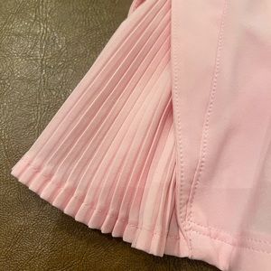 Lululemon pink tennis skirt.